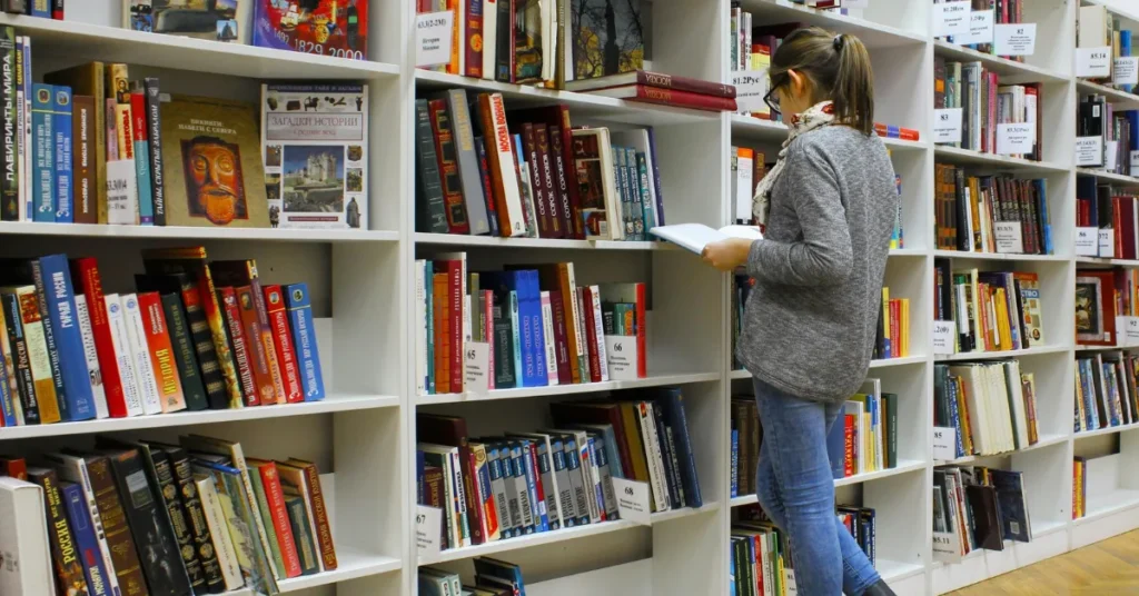 Woman reading in library