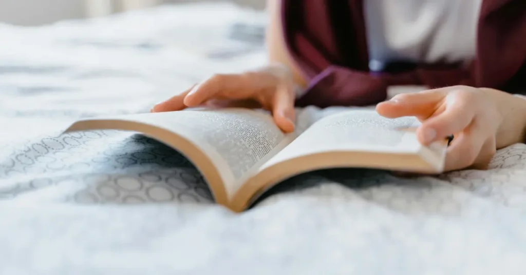 student reading book